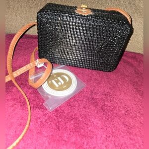 Elegant Black Woven Bag with Tan Strap